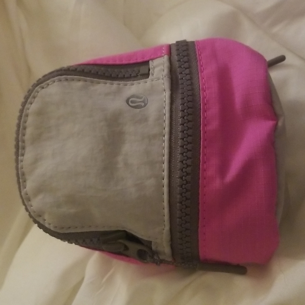 Lululemon mini backpack pink and grey attaches to fanny pack or use alone.